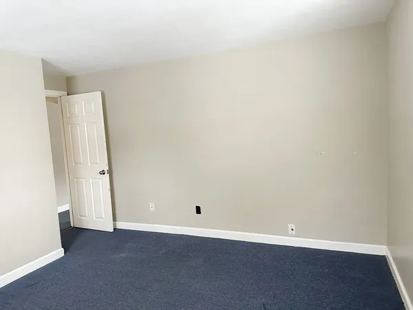 an empty room with an entryway