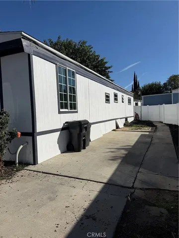a house view with a backyard space