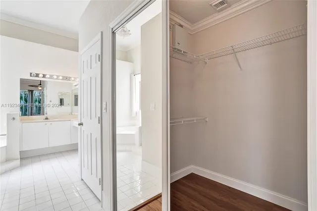 a view of small space with wooden floor