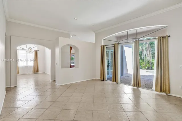 a view of a hallway with wooden shelves