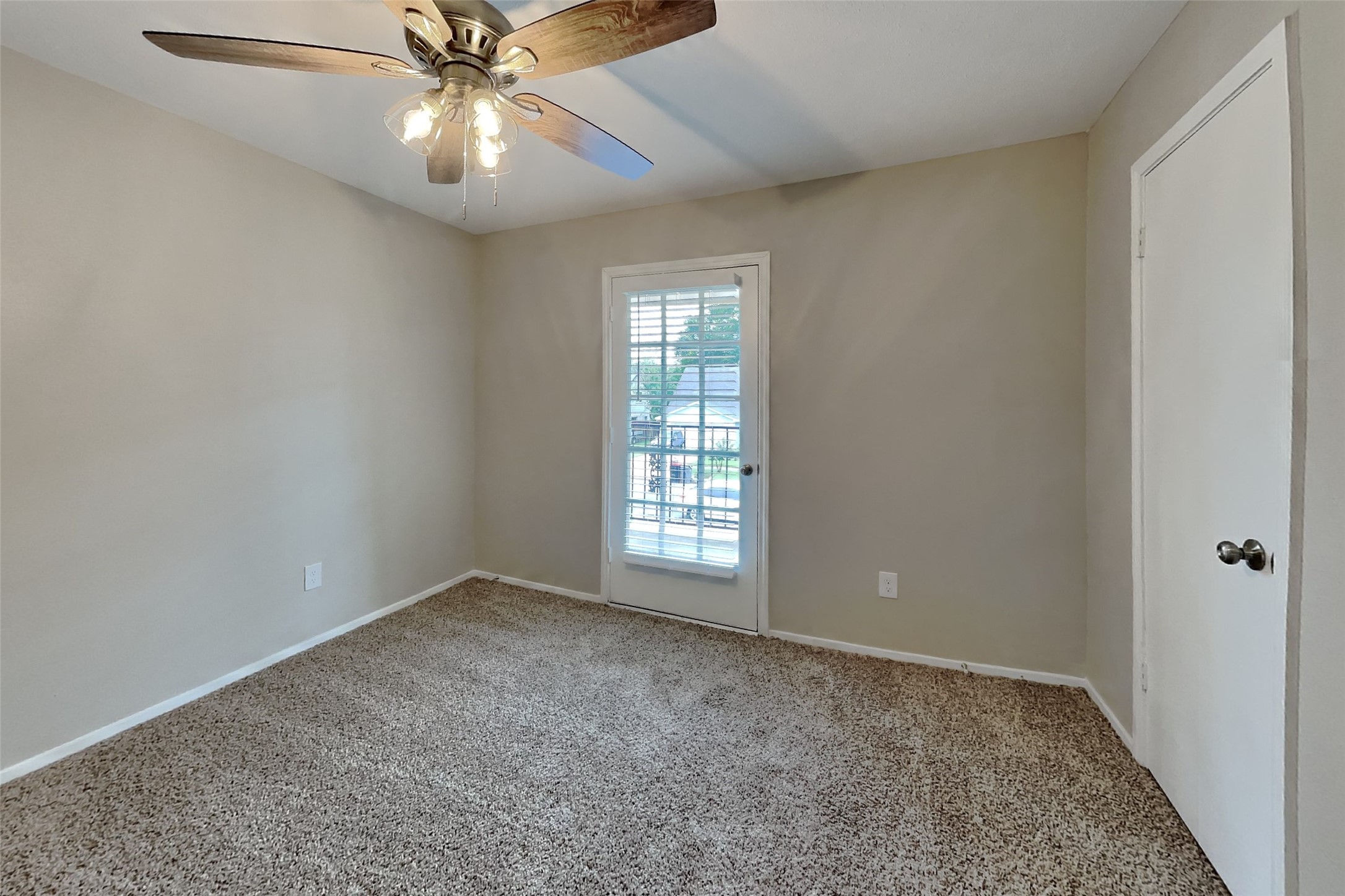 10015 Rippling Fields Drive Houston, TX 77064 - Photo 14 of 24 a view of an empty room with a window