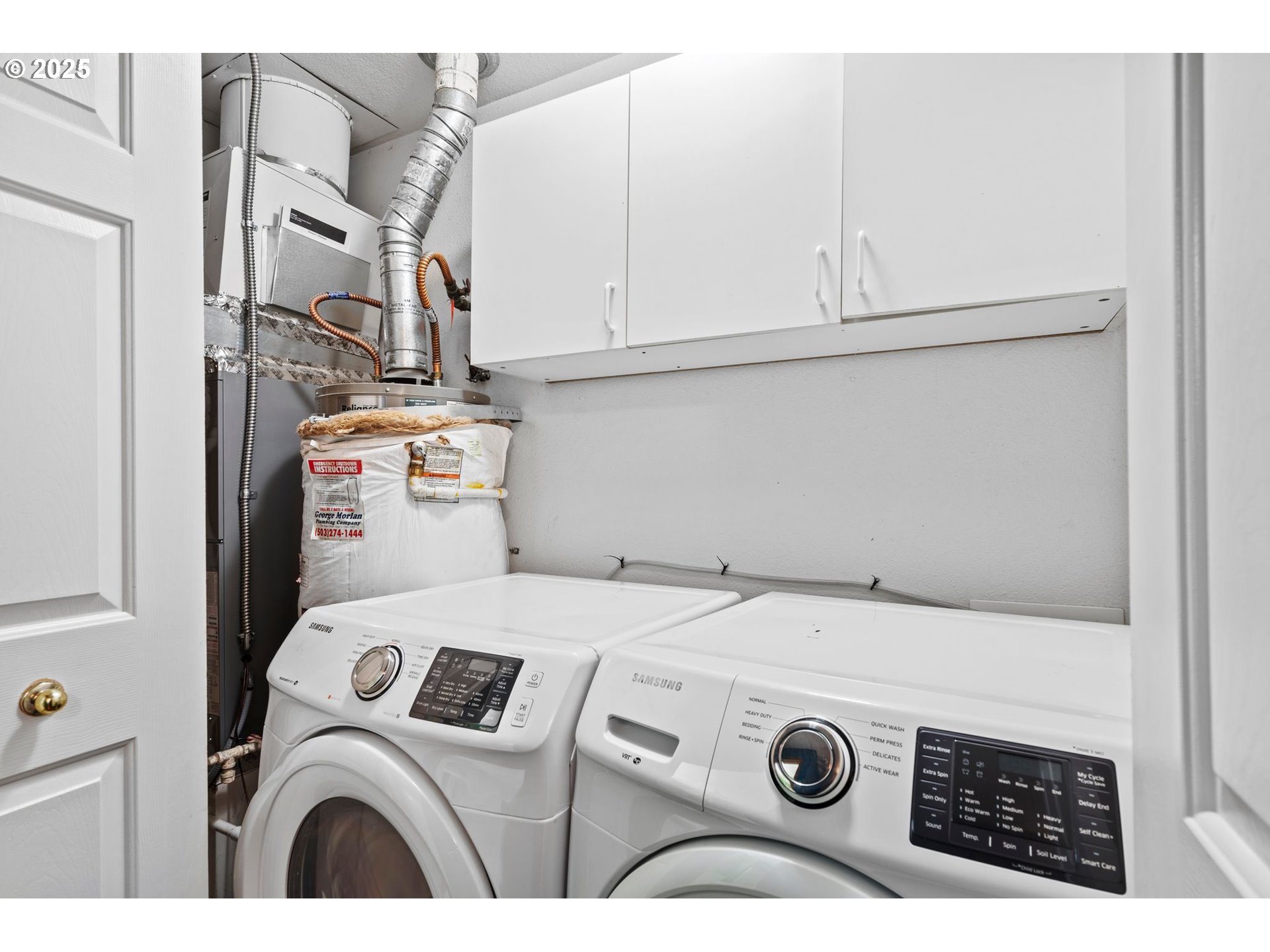 14134 East Burnside Street, Unit 2 Portland, OR 97233 - Photo 32 of 37 a utility room with dryer and washer