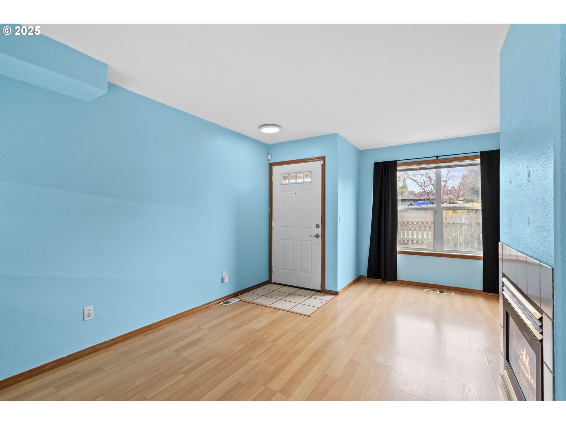 14134 East Burnside Street, Unit 2 Portland, OR 97233 - Photo 7 of 37 a view of an empty room with window