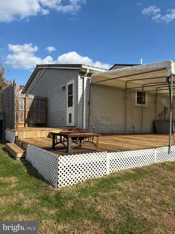 a front view of a house with a gate