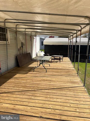 a bedroom with a bed and a table