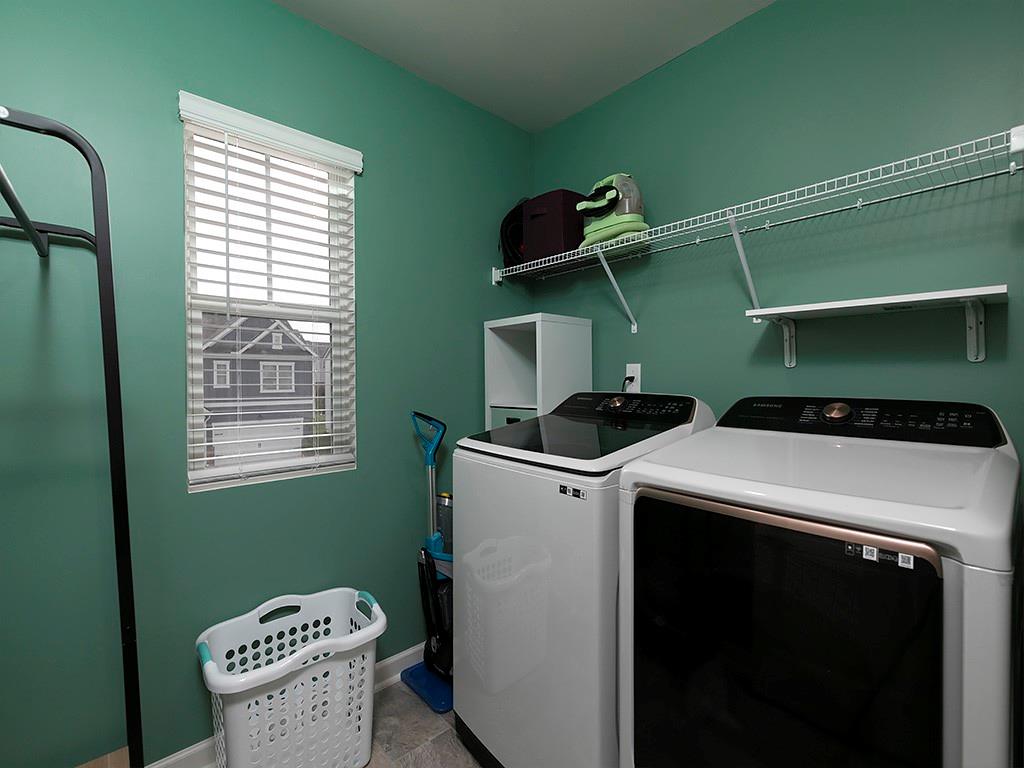 371 Highgrove Circle Dallas, GA 30157 - Photo 18 of 20 a utility room with dryer and washer