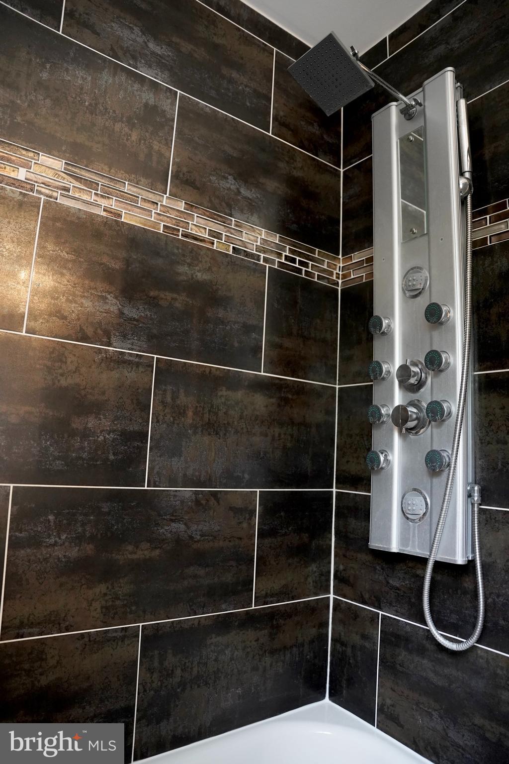 2230 Houston Street Suitland, MD 20746 - Photo 14 of 18 a bathroom with a shower