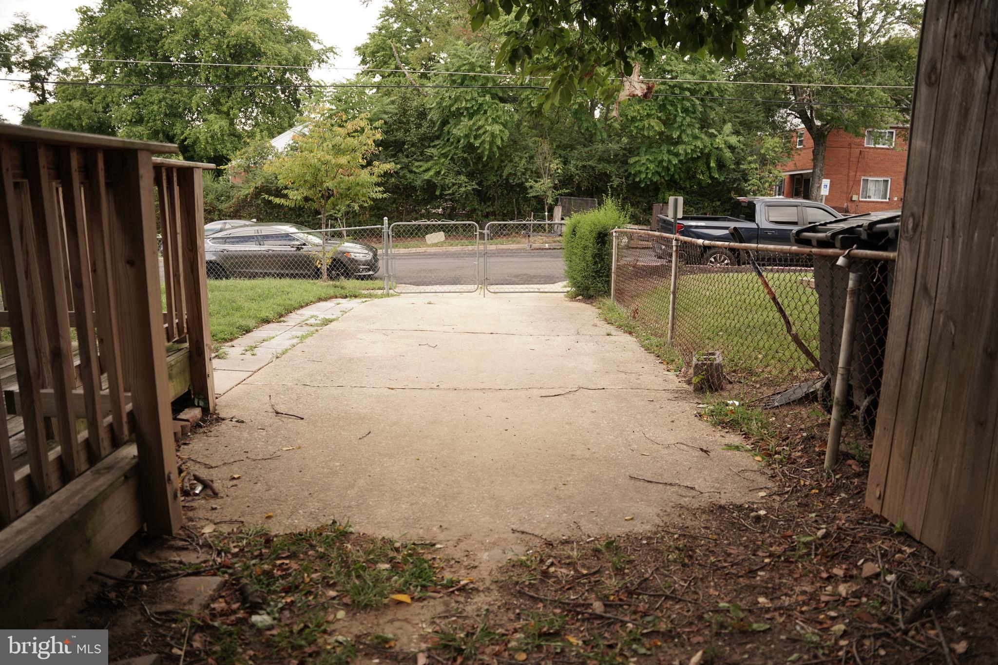 2230 Houston Street Suitland, MD 20746 - Photo 17 of 18 a view of a backyard with sitting area