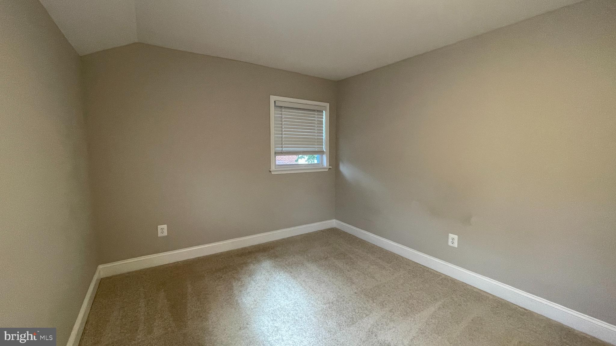 2230 Houston Street Suitland, MD 20746 - Photo 6 of 18 an empty room with a window