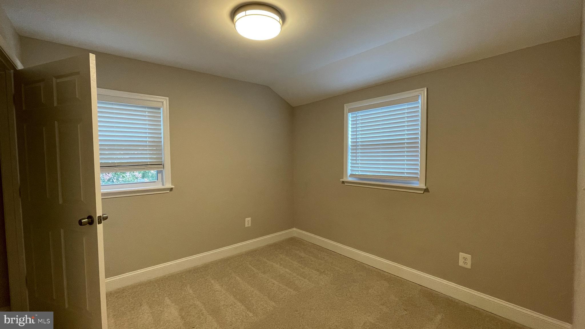 2230 Houston Street Suitland, MD 20746 - Photo 7 of 18 a view of an empty room with a window