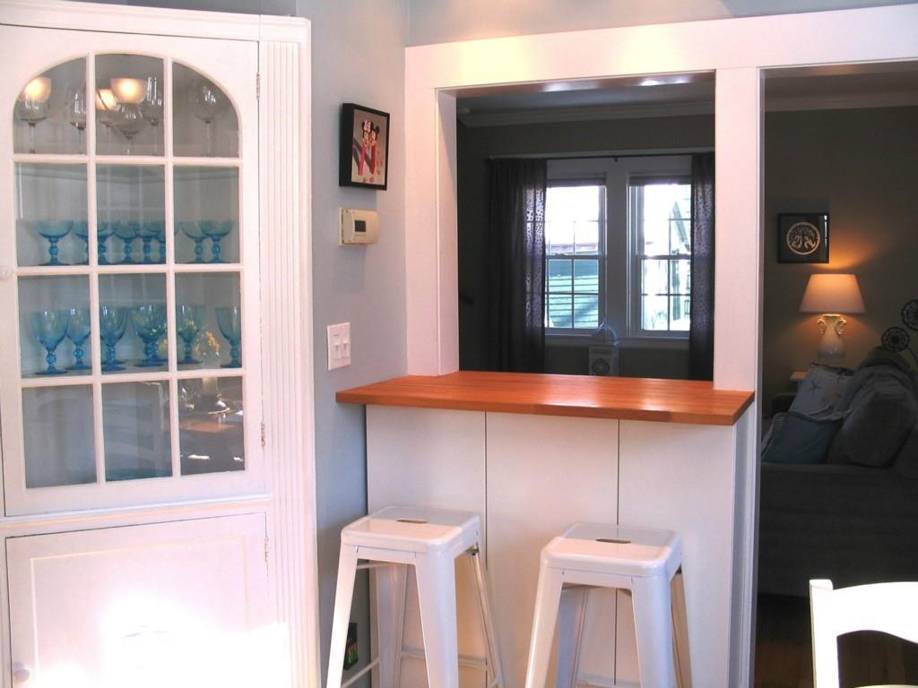 77 Academy Street Bath, ME 04530 - Photo 16 of 35 China closet and breakfast bar with...