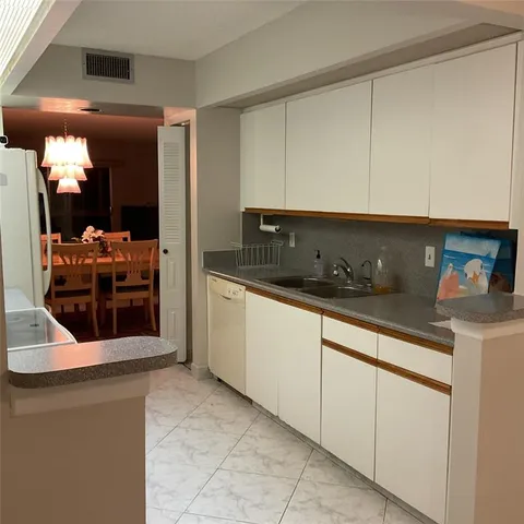 a living room with furniture and rug