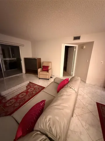 a view of swimming pool with outdoor seating