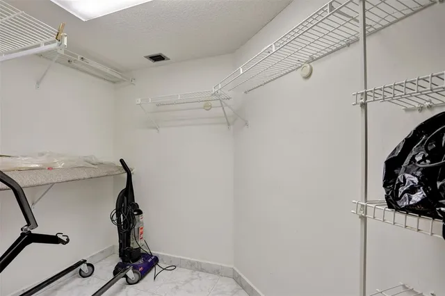 a room with gym equipment and equipment