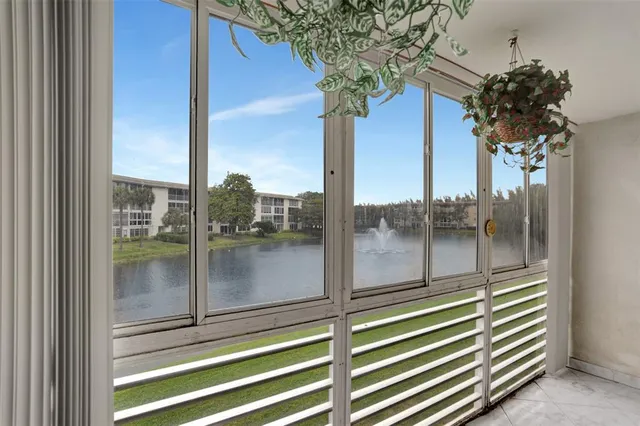 a kitchen with stainless steel appliances a stove a microwave and a refrigerator