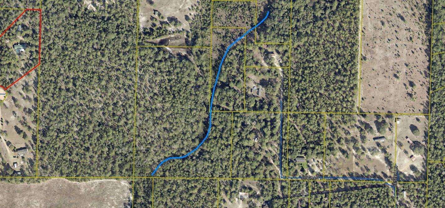 Tba Linda Lane DeFuniak Springs, FL 32433 - Photo 3 of 10 a bathroom with a shower curtain