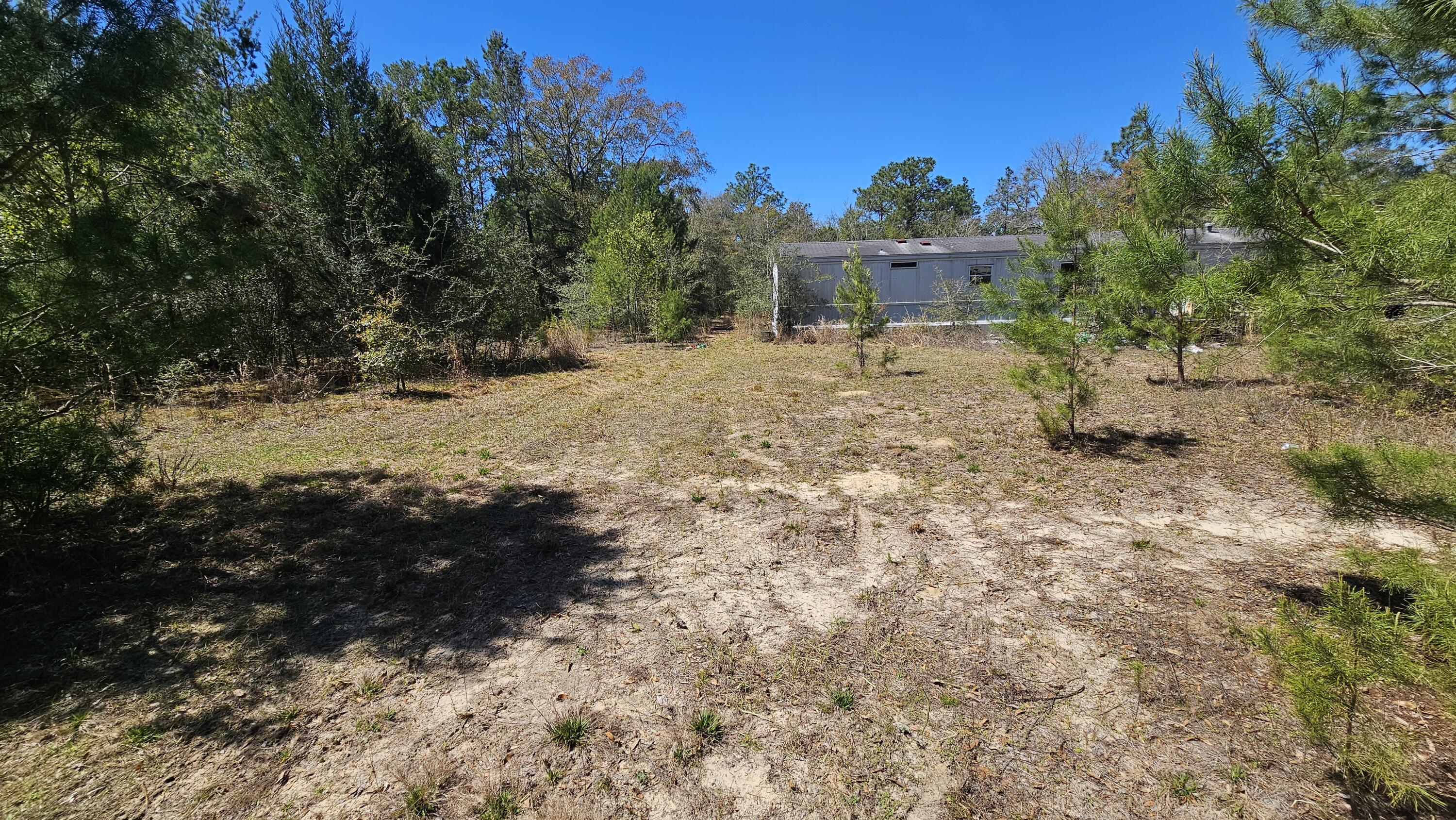 Tba Linda Lane DeFuniak Springs, FL 32433 - Photo 10 of 10 a view of a house with a yard