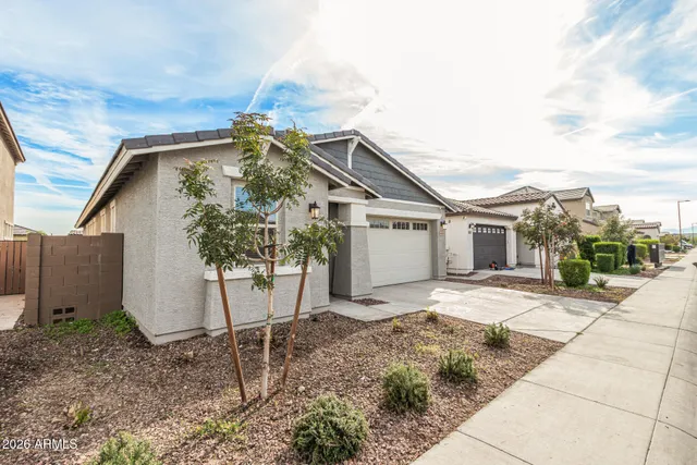 a view of hallway with wooden floor