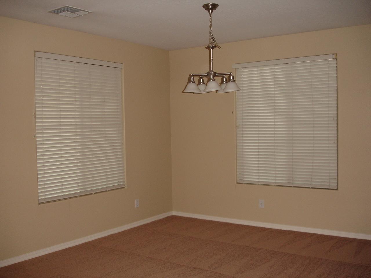 4744 East Timberline Road Gilbert, AZ 85297 - Photo 2 of 25 an empty room with a window