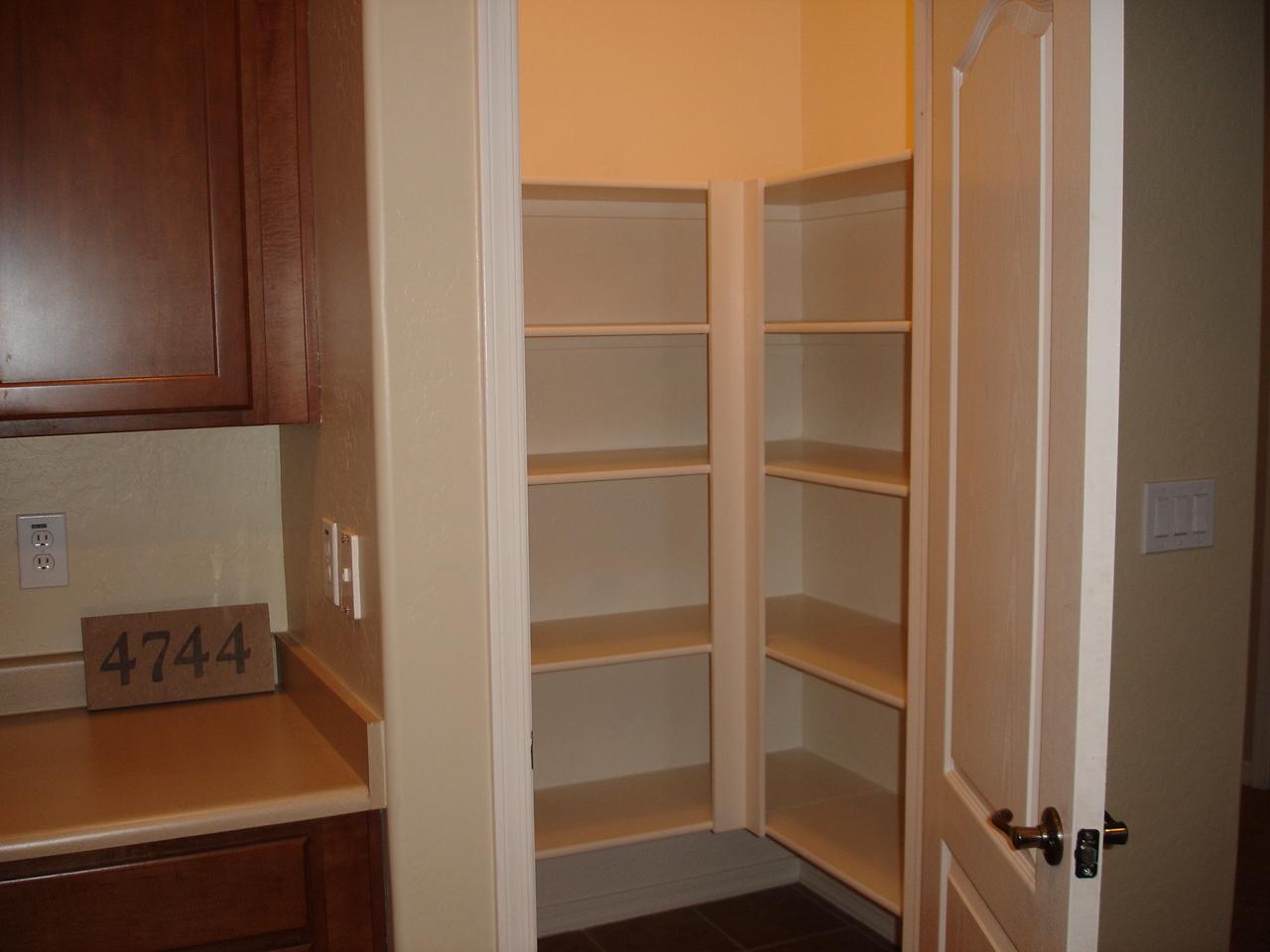 4744 East Timberline Road Gilbert, AZ 85297 - Photo 8 of 25 a room with storage and utility