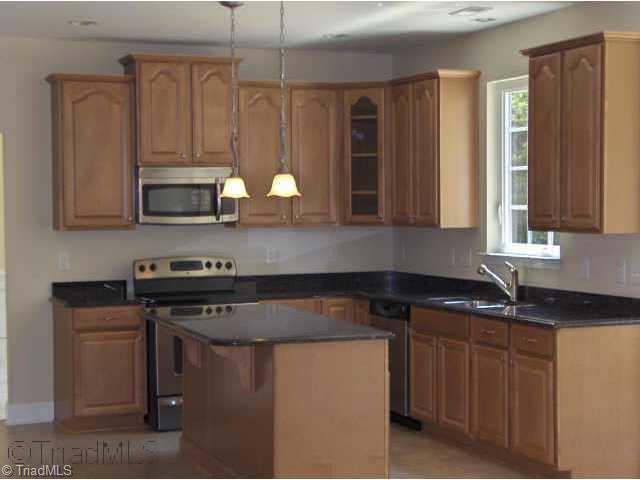 3040 Sycamore Point Trail High Point, NC 27265 - Photo 5 of 9 Other. Incredible kitchen, tons of storage, sit down island, granite, 42 maple with molding