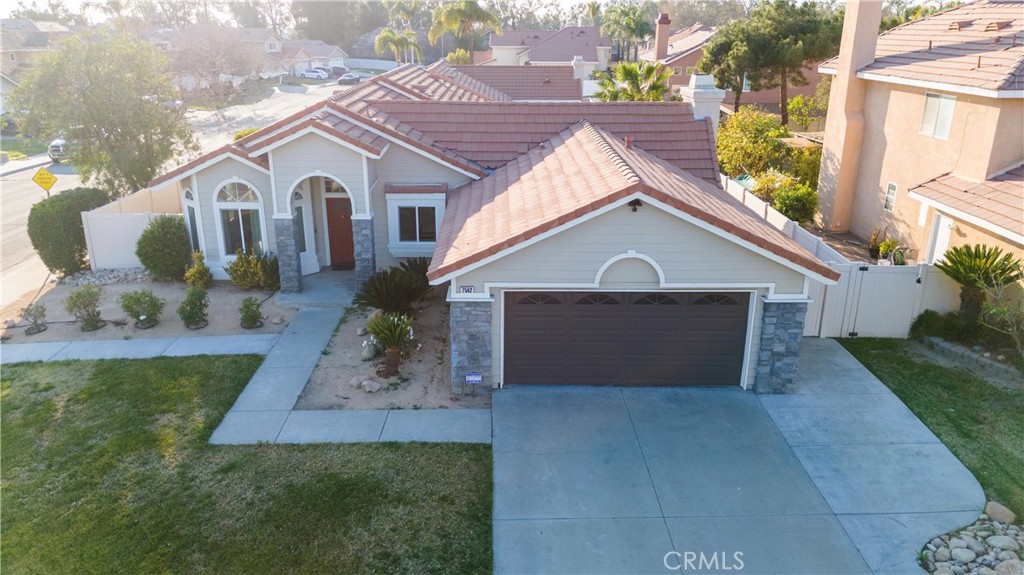 7562 Webster Street Highland, CA 92346 - Photo 2 of 30 a view of a yard in front view of a house
