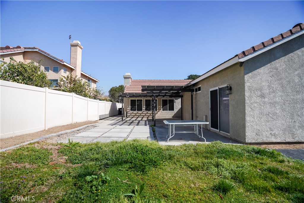 7562 Webster Street Highland, CA 92346 - Photo 30 of 30 a front view of a house with garden