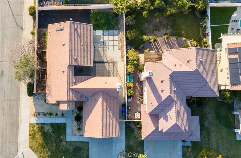 7562 Webster Street Highland, CA 92346 - Photo 4 of 30 an aerial view of residential houses with outdoor space and lake view