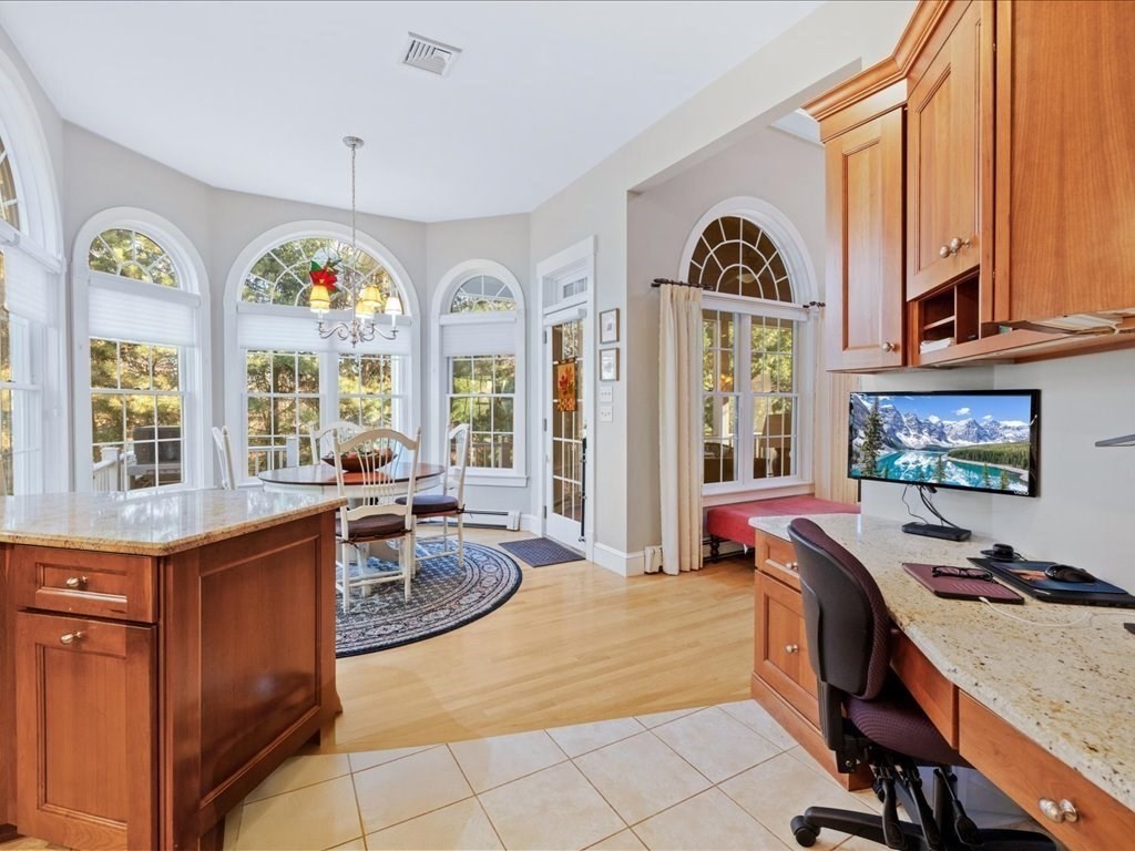 15 Cushing Hill Road Hanover, MA 02339 - Photo 12 of 42 a very nice looking living room with a large window a dining table and chairs