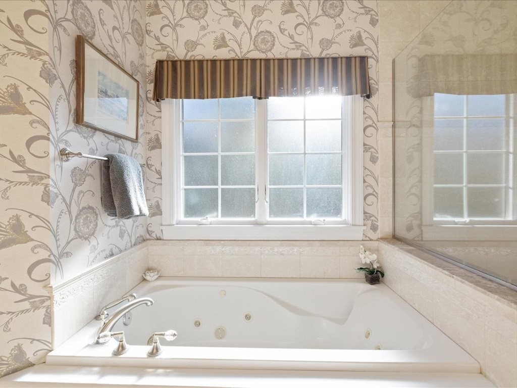 15 Cushing Hill Road Hanover, MA 02339 - Photo 25 of 42 a bathroom with bathtub and window