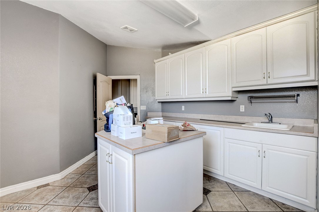 631 Lomprey Avenue Henderson, NV 89002 - Photo 66 of 99 Loads of cabinet space & room for two washers and dryers.