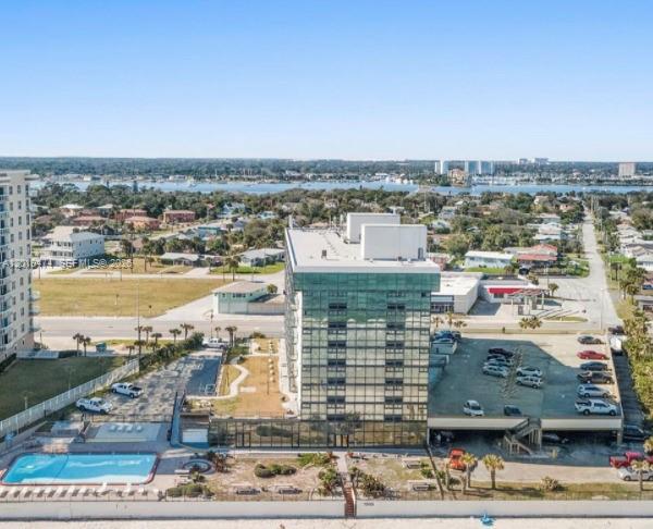 1909 South Atlantic Avenue, Unit 803804 Daytona Beach, FL 32118 - Photo 24 of 43 an aerial view of a city with ocean view