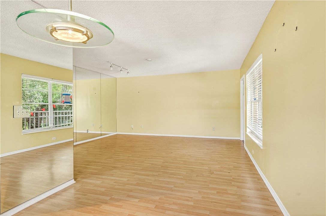 45 Vista Gdns Trail, Unit 202 Vero Beach, FL 32962 - Photo 11 of 32 a view of an empty room with a window