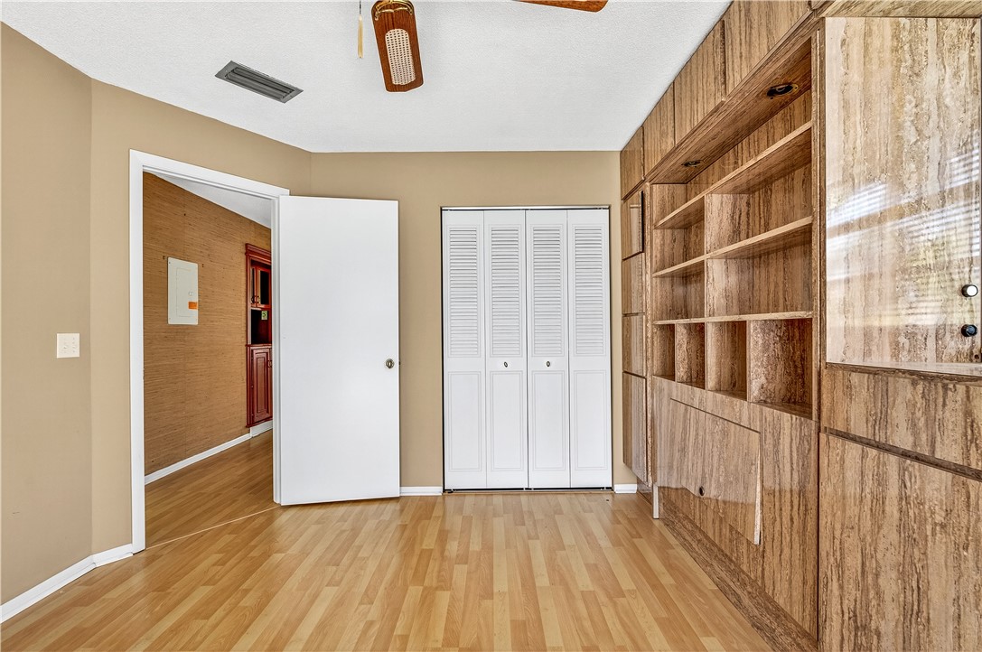 45 Vista Gdns Trail, Unit 202 Vero Beach, FL 32962 - Photo 25 of 32 a view of an entryway with wooden floor