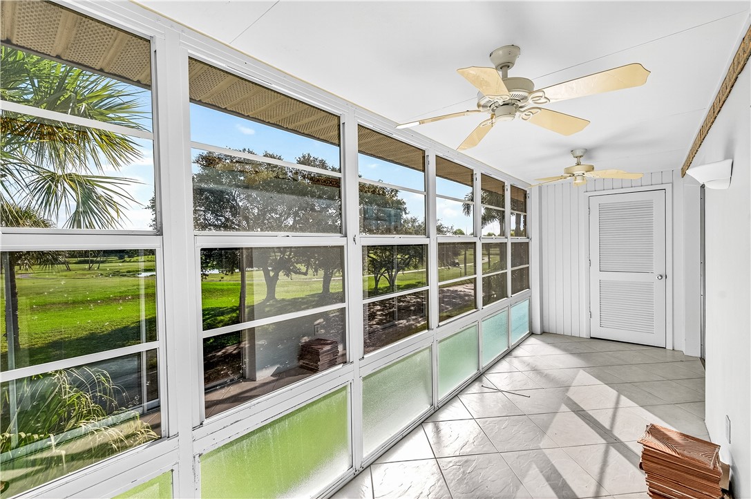 45 Vista Gdns Trail, Unit 202 Vero Beach, FL 32962 - Photo 4 of 32 a view of a room with a large window