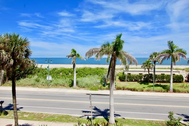 a view of a street with sitting area