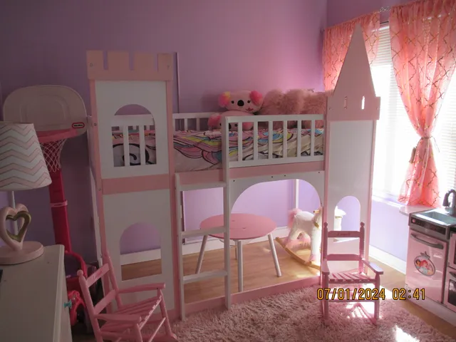 a view of a chairs and table in a patio