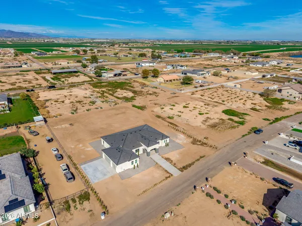 a kitchen with a sink and a stove top oven