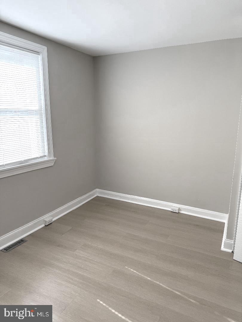 815 East Cold Spring Lane Baltimore, MD 21212 - Photo 19 of 43 an empty room with a window