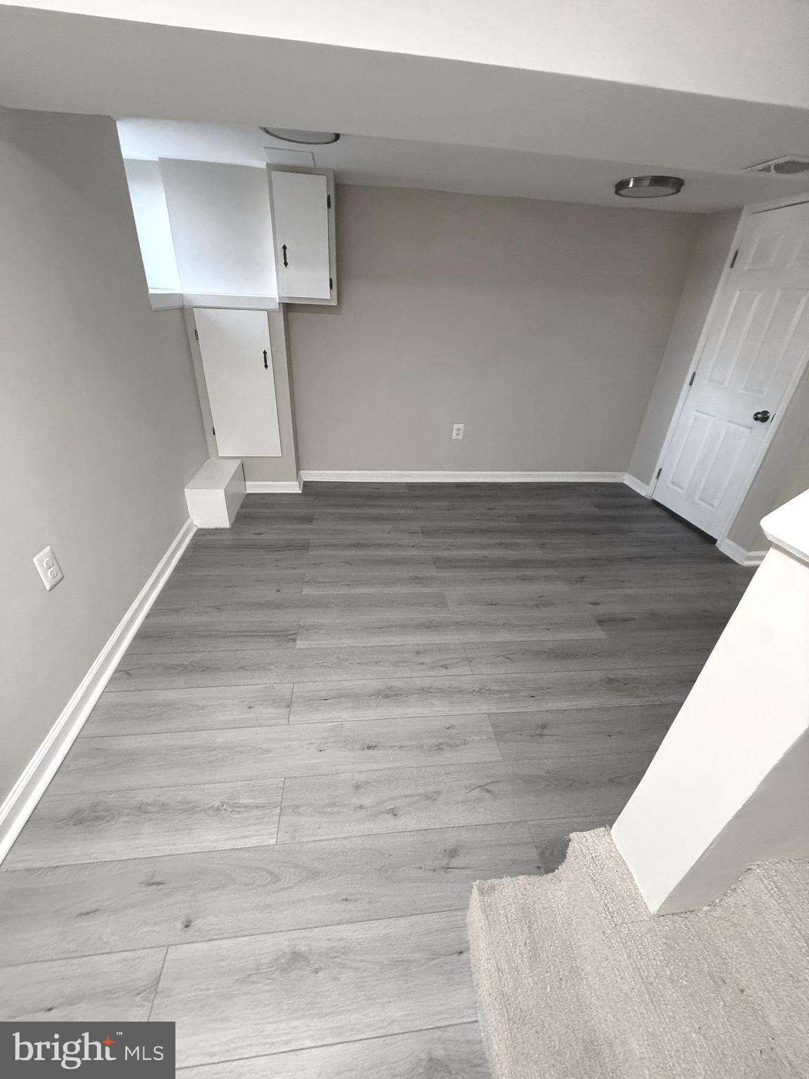 815 East Cold Spring Lane Baltimore, MD 21212 - Photo 27 of 43 a view of a room with wooden floor