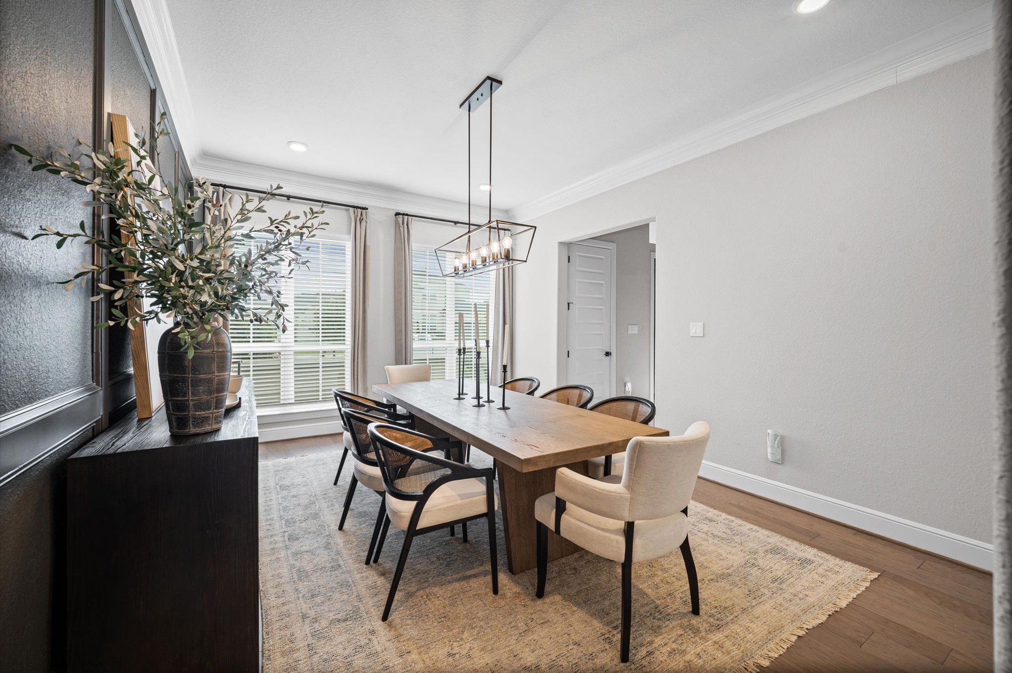 4923 Grapevine Lane Manvel, TX 77578 - Photo 21 of 49 a view of a dining room with furniture window and wooden floor