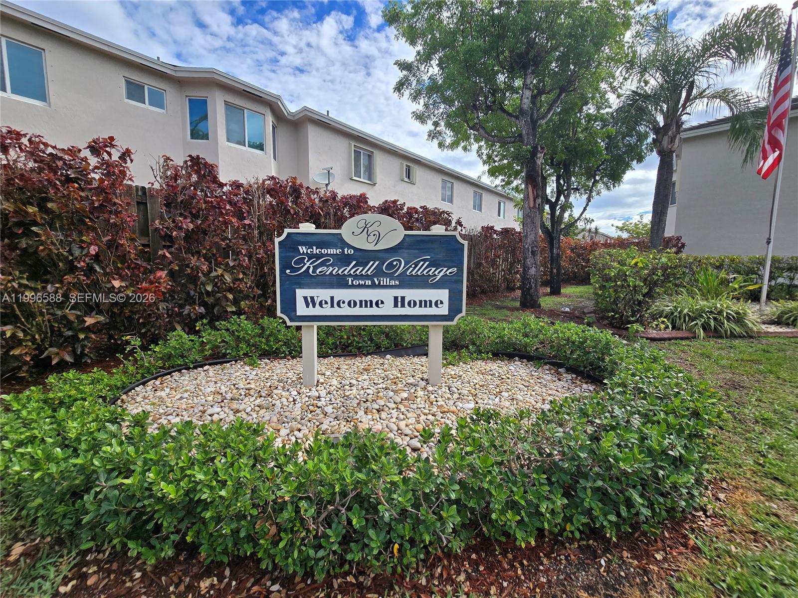 a sign on the side of the house