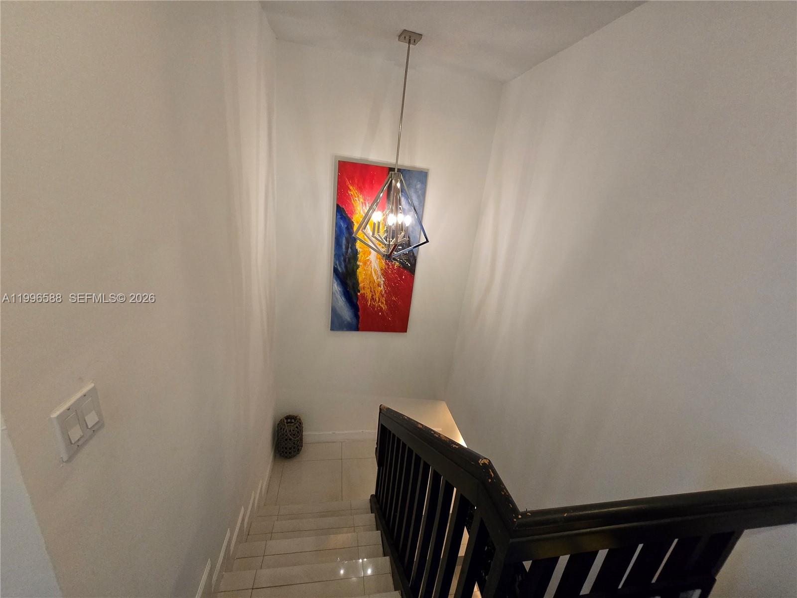 8441 Southwest 124th Avenue, Unit 106 Miami, FL 33183 - Photo 11 of 24 a view of a hallway with workspace