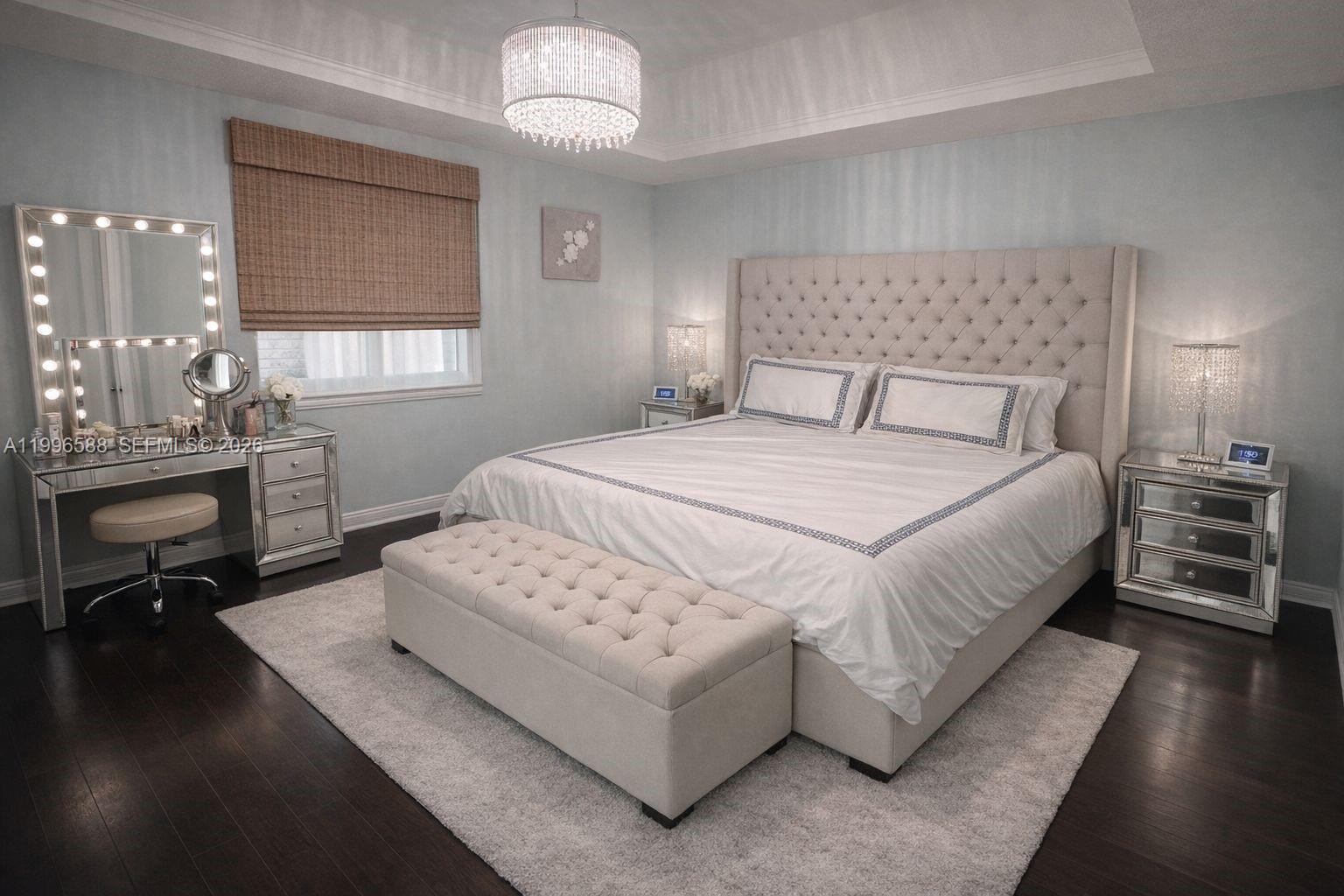 8441 Southwest 124th Avenue, Unit 106 Miami, FL 33183 - Photo 12 of 24 a bedroom with a bed a dresser and window