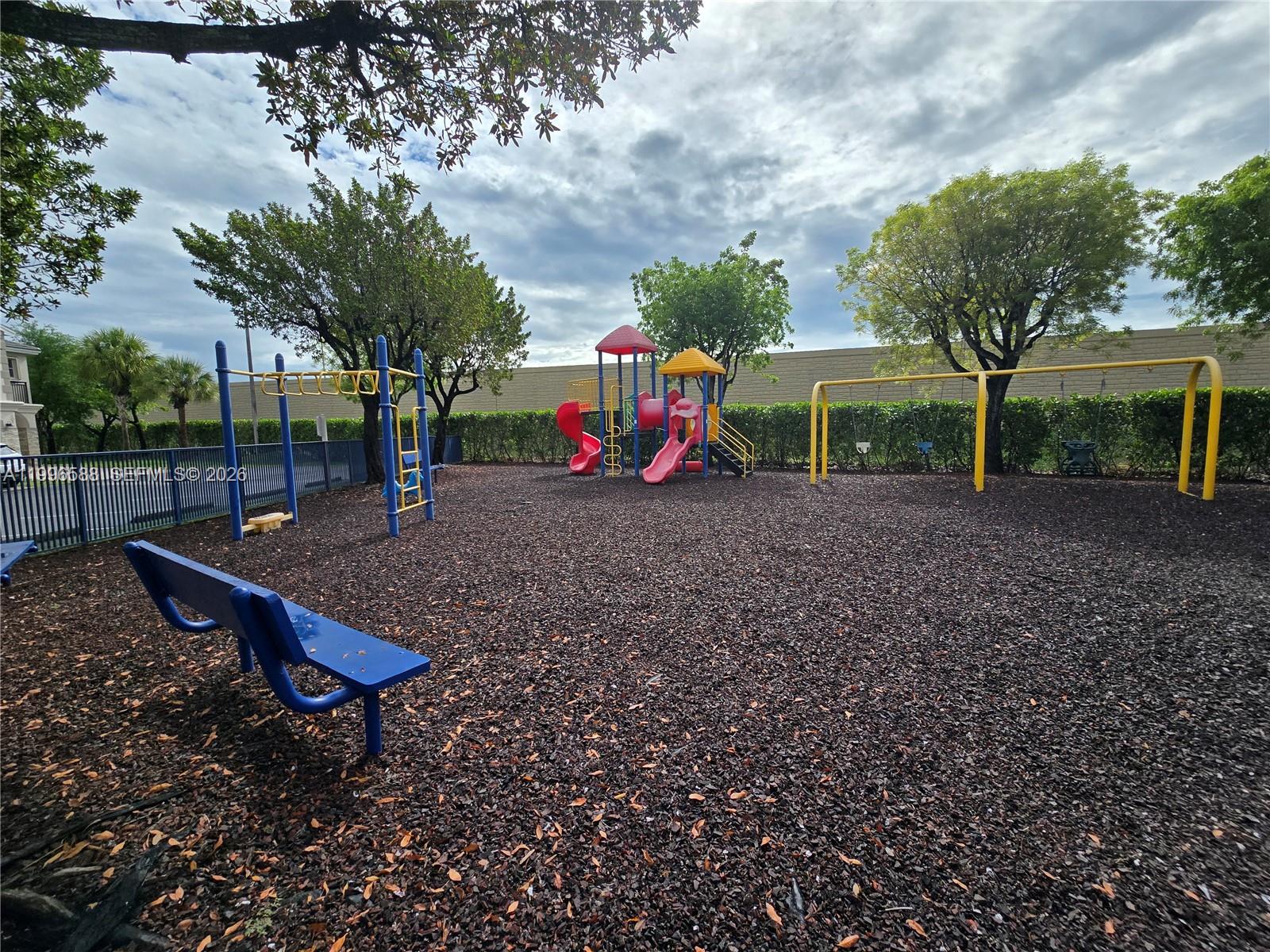 8441 Southwest 124th Avenue, Unit 106 Miami, FL 33183 - Photo 24 of 24 a view of a park with slide