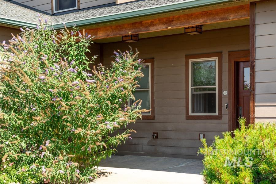 1933 Fletcher Place Moscow, ID 83843 - Photo 43 of 44 Property entrance featuring a shingled roof and covered porch