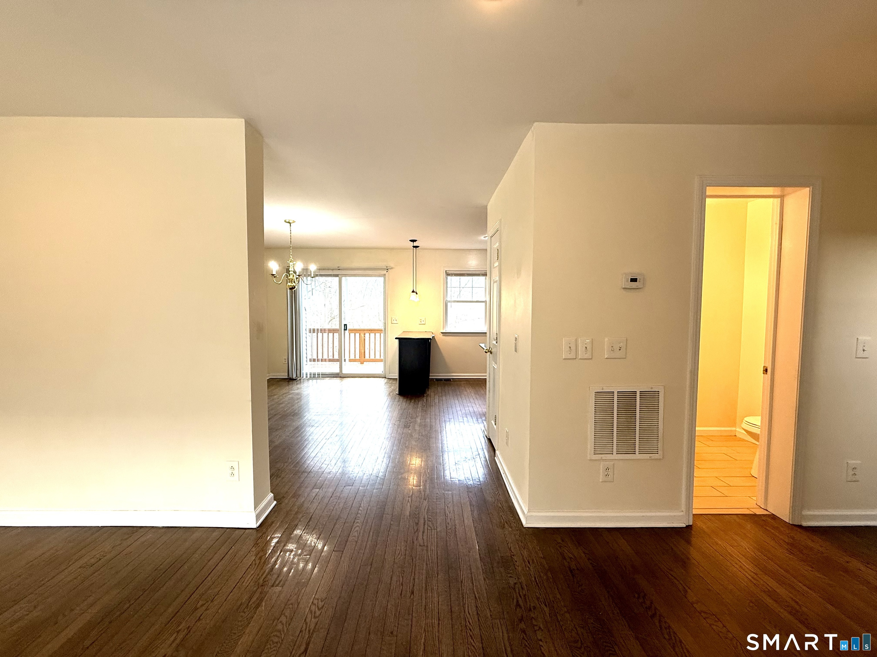15 Scuppo Road, Unit 603 Danbury, CT 06811 - Photo 7 of 29 a view of a hallway with wooden floor
