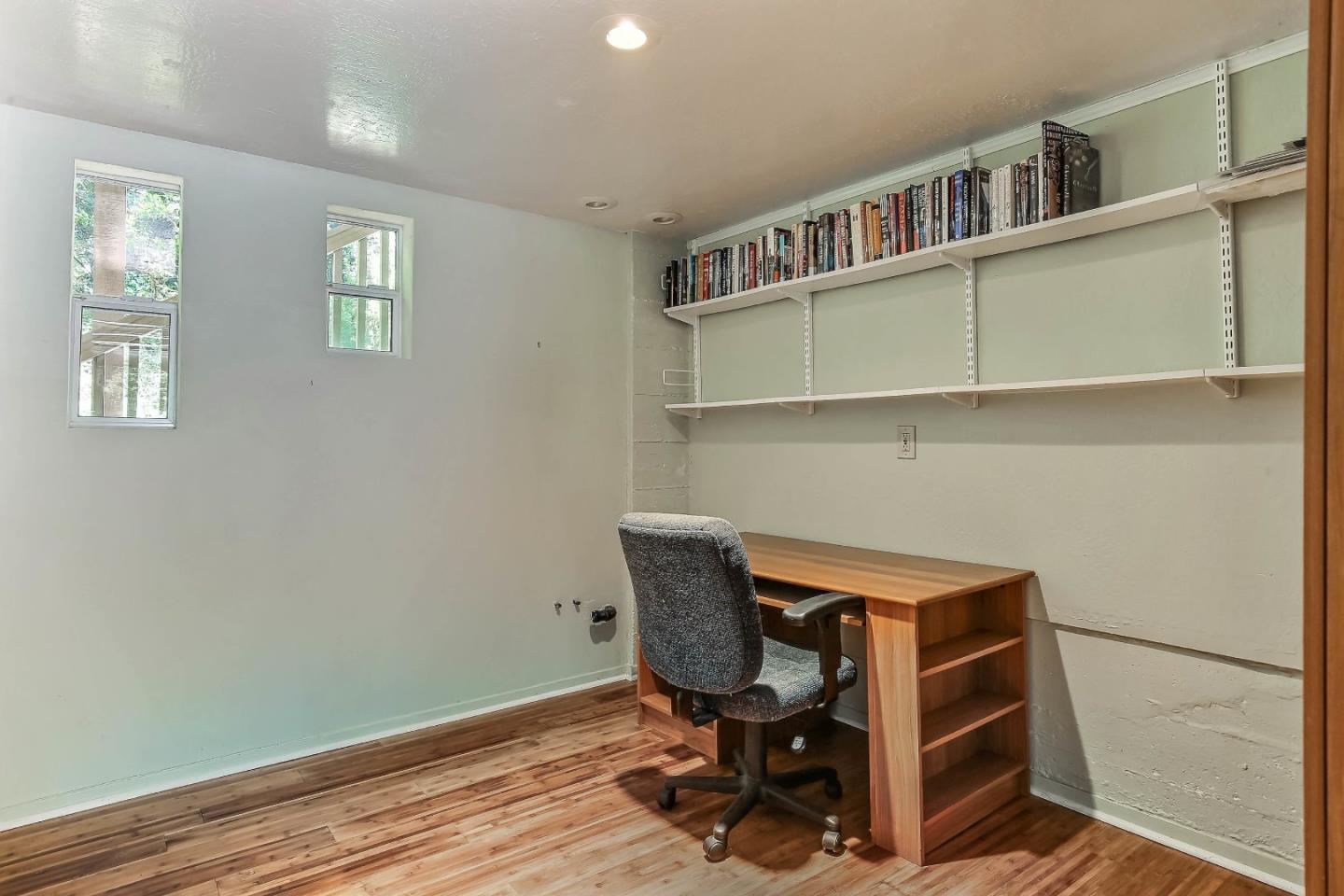 655 Aurora Road Soquel, CA 95073 - Photo 14 of 22 a view of a workspace with furniture and a window