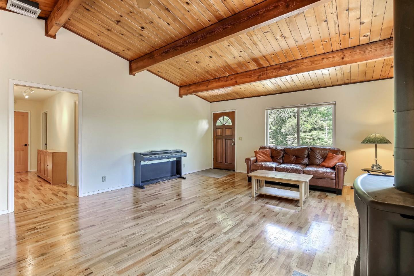 655 Aurora Road Soquel, CA 95073 - Photo 5 of 22 a living room with furniture and a large window