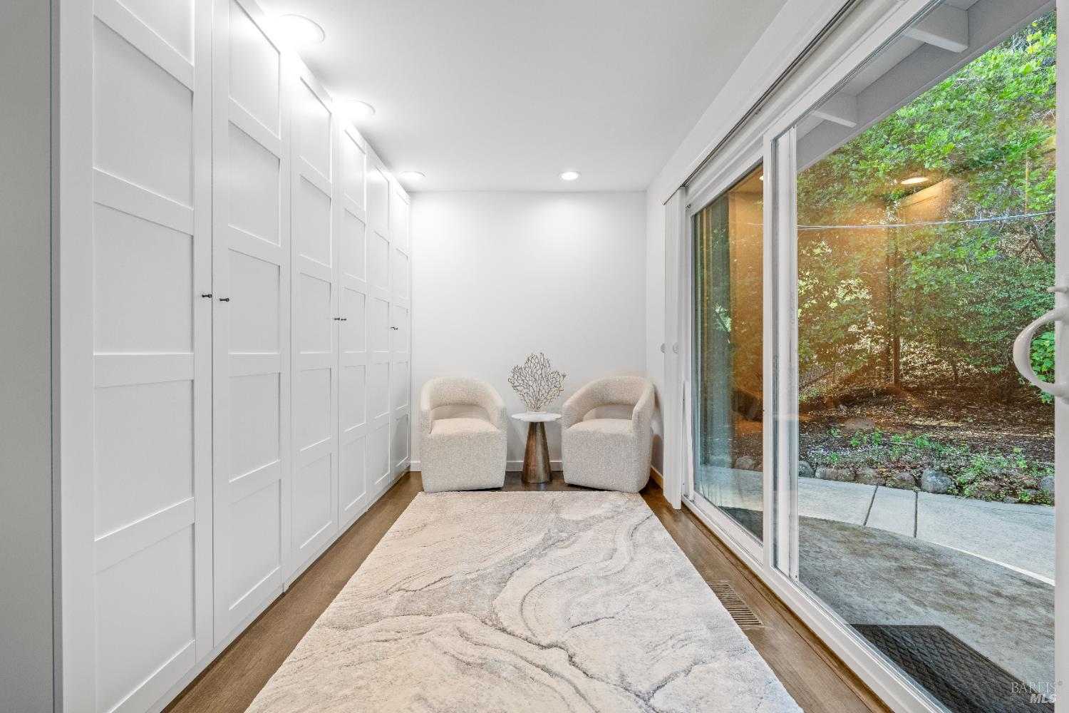 71 Convent Court San Rafael, CA 94901 - Photo 18 of 37 a spacious bedroom with a large bed and a large window